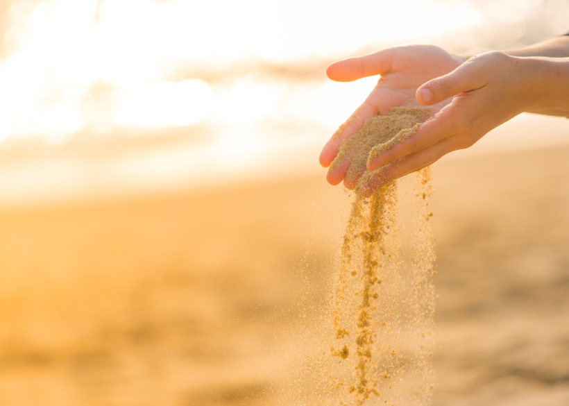 playing sand in beach