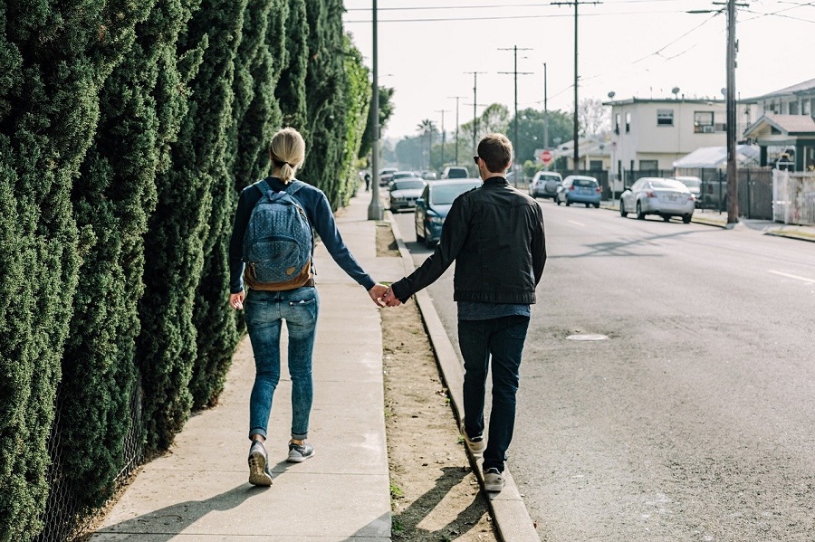 Couple is holding hands